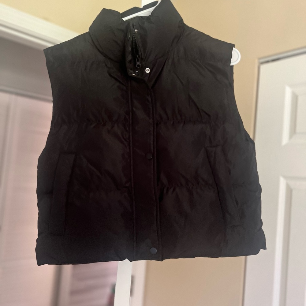 Puffer vest, new and never worn.